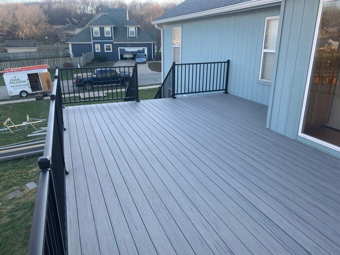 black fence and deck